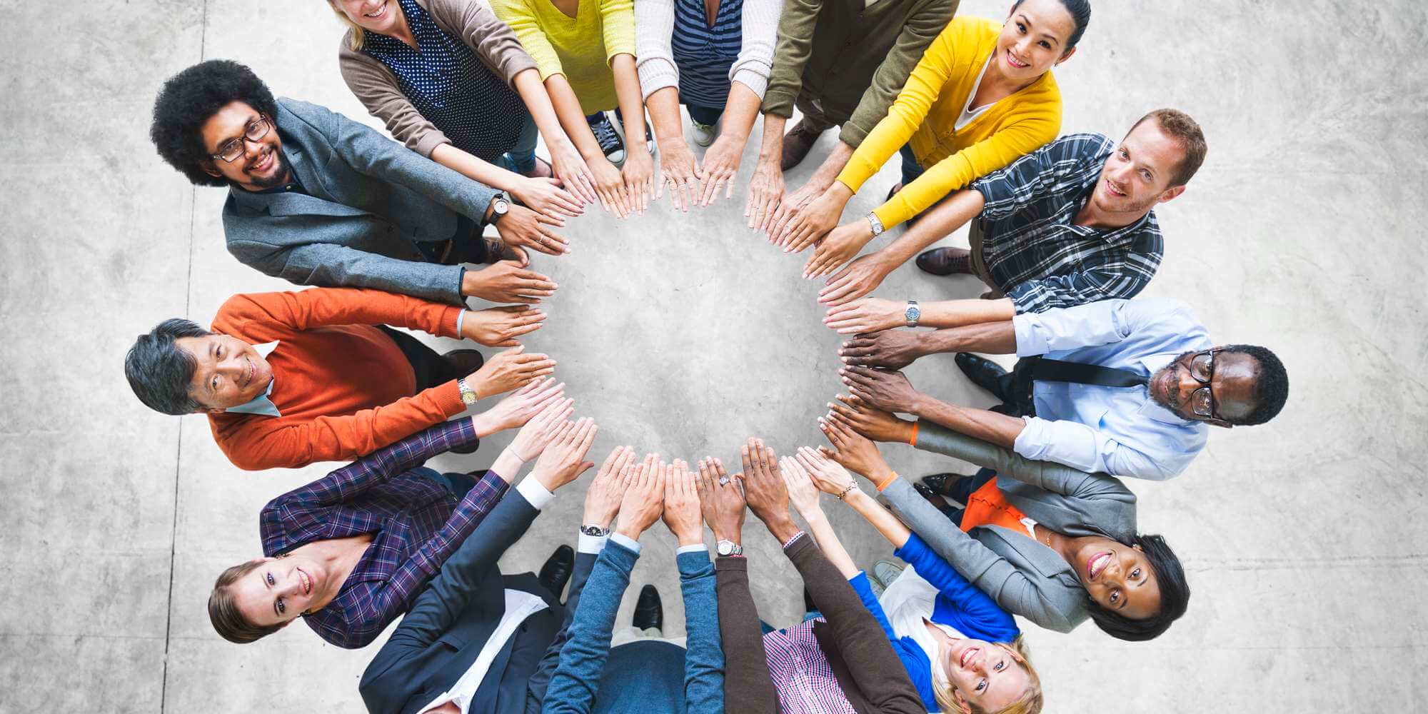 Multi-Ethnic Diverse Group of People In Circle Concept